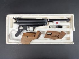 A Feinwerkbau Mod 80 .177 cal side lever target air pistol, Serial No.229818, (bolts for grip