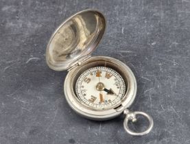 A WWI British military Mk.VI nickel plated pocket compass, by Clement Clarke Ltd, London, dated