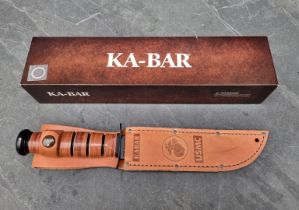 A Ka-Bar '1217' USMC knife and sheath, having 18cm blade, boxed.