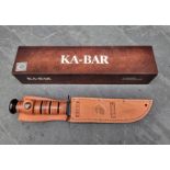 A Ka-Bar '1217' USMC knife and sheath, having 18cm blade, boxed.