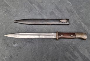 A German WWII Mauser bayonet by F Herderer, stamped '38' and No.8920; together with scabbard by F