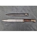 A German WWII Mauser bayonet by F Herderer, stamped '38' and No.8920; together with scabbard by F