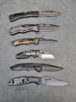 A Byrd folding knife, having 10cm blade; together with five other folding knives. (6)