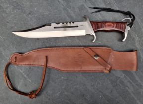 A Hibben 'Mark 3' Bowie knife and sheath, having 27.5cm blade.