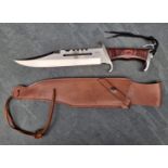 A Hibben 'Mark 3' Bowie knife and sheath, having 27.5cm blade.