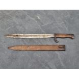 A German WWI S1898/05 'Butchers' bayonet and scabbard, stamped 'Deutsche Maschinenfabrik A.G.