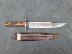 A Victorian Bowie knife and sheath, with 22.5cm steel blade marked 'J. Rodgers & Co, No.6 Norfolk