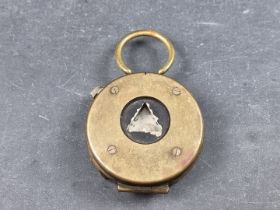 A WWI British officer's military compass, by S Mordan & Co, dated 1918 with broad arrow mark and