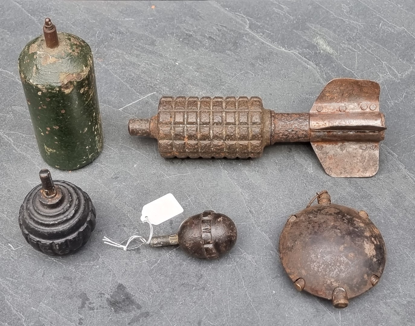 Three WWI German military grenades; comprising a Model 1915 Kugel grenade; a Turtle Offensive