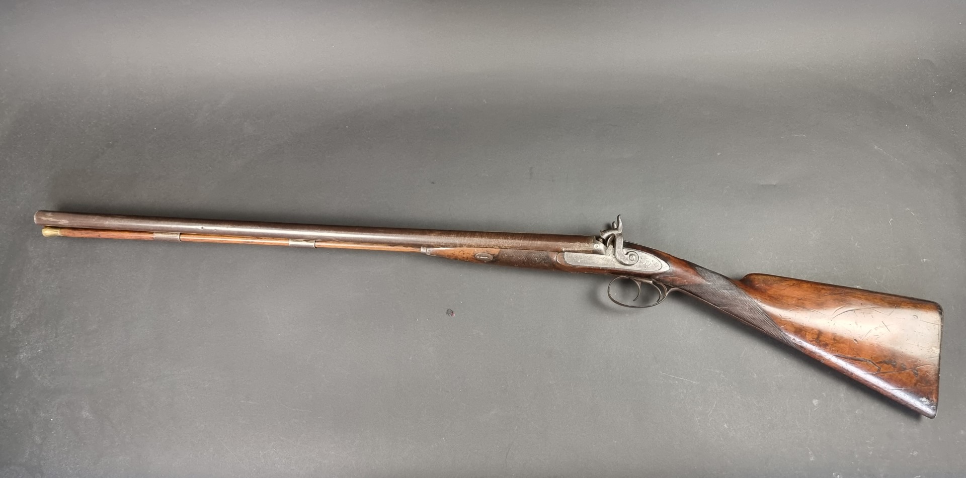 A Victorian double barrelled muzzle loading percussion shotgun, by Charles Osborne of London, having