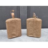 Two WWII British army water canteens, both covered in khaki fabric, 21cm high including spout.