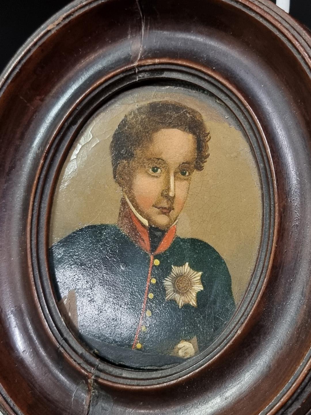 A 19th century Russian portrait miniature of a young man in uniform, wearing The Order of The - Image 2 of 3