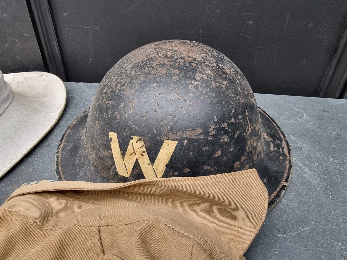 A group of militaria; comprising a British gas mask, dated 1943; an RAF officer's peaked cap; an ARP - Image 3 of 7