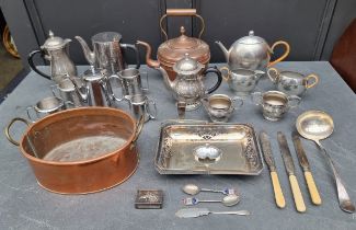 A mixed group of metalware.