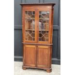 An old mahogany standing corner cupboard, 98cm wide.
