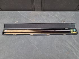 An 'RLE Customs Cues' two-piece snooker cue, in BCE Ronnie O'Sullivan case.