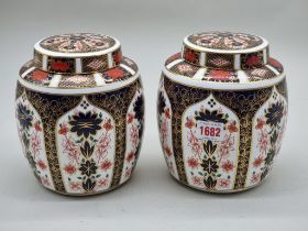 A pair of Royal Crown Derby Imari ginger jars and covers, 18cm high.