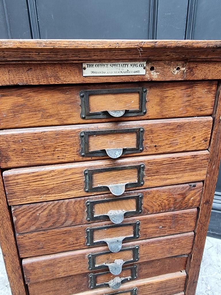 A small 1920s oak filing chest, labelled 'The Office Speciality MFG Co, Toronto...', 79.5cm high x - Image 2 of 5