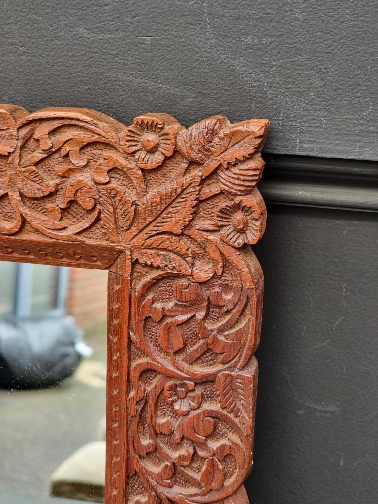 A Thai carved hardwood framed wall mirror, 42 x 50cm. - Image 2 of 3