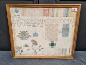 An unusual 19th century Quaker style sampler, 31.5 x 39.5cm.