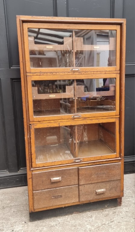 A vintage oak haberdashery cabinet, 168.5cm high x 87cm wide x 55cm deep.