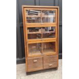 A vintage oak haberdashery cabinet, 168.5cm high x 87cm wide x 55cm deep.