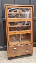 A vintage oak haberdashery cabinet, 168.5cm high x 87cm wide x 55cm deep.