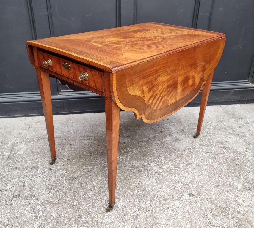 A George III satinwood and inlaid Pembroke table, 96cm wide.