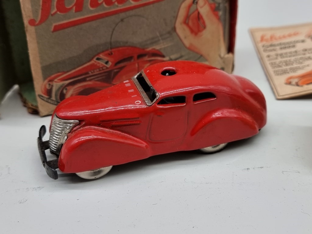 Schuco: a vintage red Schuco Telesteering car 3000, with box, key, instructions and accessories. - Image 2 of 3