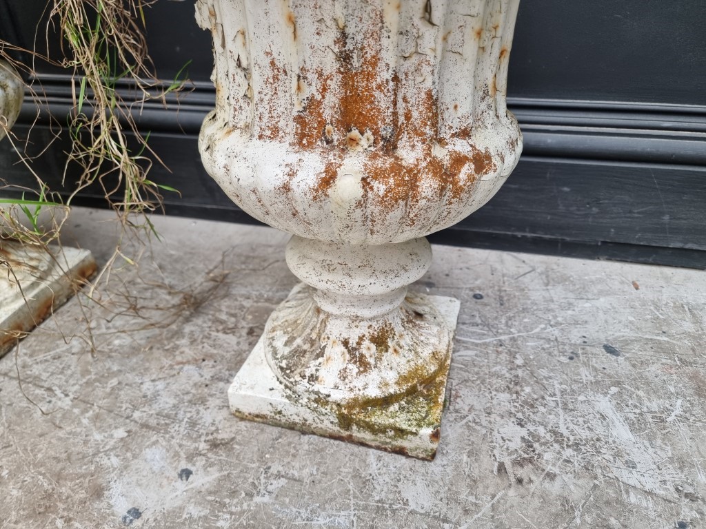 A pair of Victorian white painted cast iron urns, 48.5cm high. (2) - Image 3 of 4