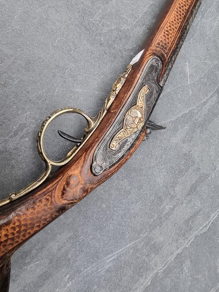 A reproduction flintlock musket; together with two similar pistols. (3) - Image 2 of 14