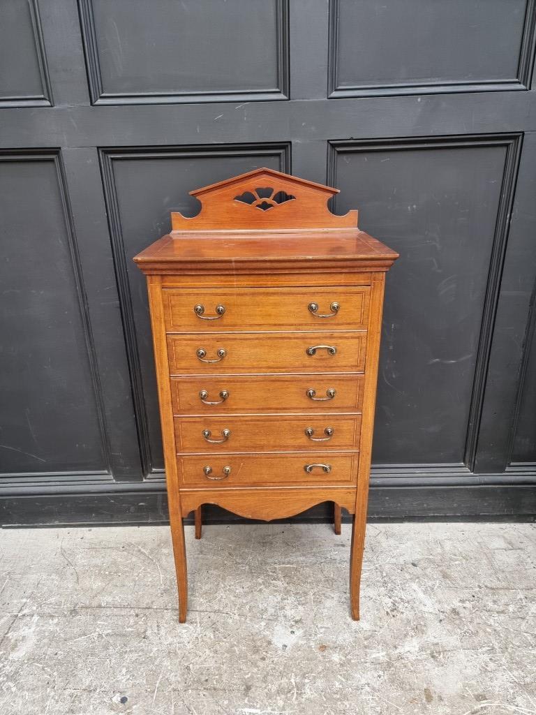 An Edwardian mahogany and line inlaid music cabinet, 52cm wide.