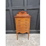 An Edwardian mahogany and line inlaid music cabinet, 52cm wide.