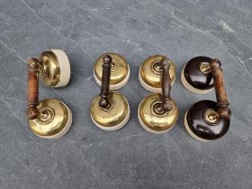 Four pairs of vintage double light switches.