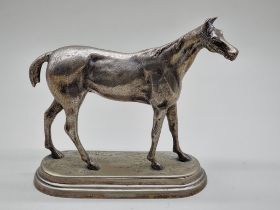An electroplated race horse, 24.5cm high.