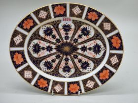 A Royal Crown Derby Imari oval plate, 33.5cm wide.