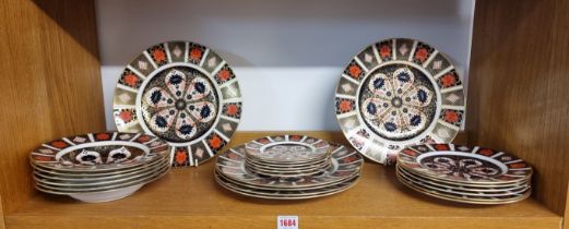 A collection of Royal Crown Derby Imari plates, comprising: six 27cm; six 21.5cm; six 16cm; and