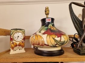 A Moorcroft 'Anna Lily' pattern table lamp, total height 30.5cm; together with a similar