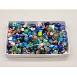 A collection of glass marbles.