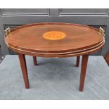A late Victorian mahogany and inlaid twin handled oval gallery tray, 78cm wide, on associated stand.