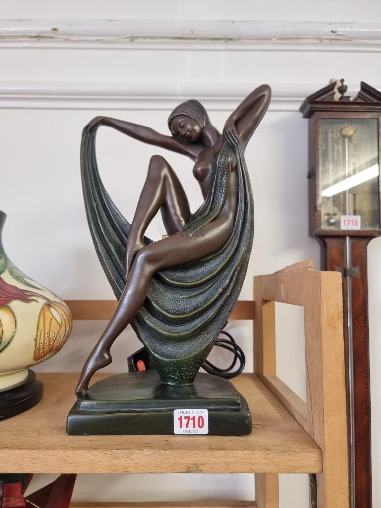 An Art Deco style bronzed resin figural table lamp, 36cm high.