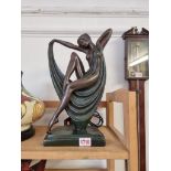 An Art Deco style bronzed resin figural table lamp, 36cm high.