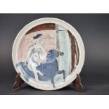 Studio Pottery: an Eric James Mellon 'Circus' plate, signed, titled and dated 03/93, 29cm diameter.