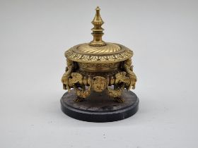 A Renaissance revival gilt bronze inkwell and cover, on slate base, 14cm high.