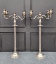 A large pair of four branch candelabra, 80cm high. (2)