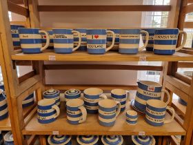 A collection of T G Green & Co Cornishware mugs an related. (two shelves)