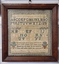 A Victorian needlework sampler, inscribed 'Lucy Harwood finished this work Sutton School, March