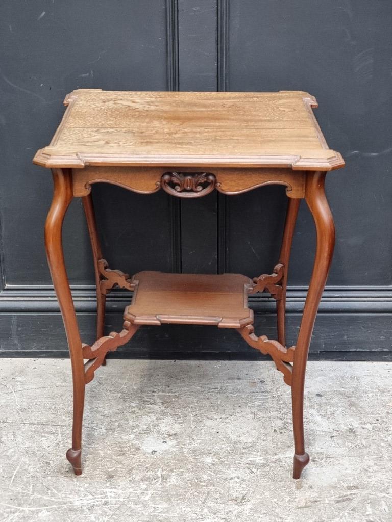 A late Victorian mahogany centre table, with platform undertier, 60cm wide.