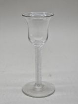 An 18th century combined twist stem wine glass, 15.5cm high.