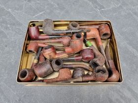A collection of briarwood and other pipes.